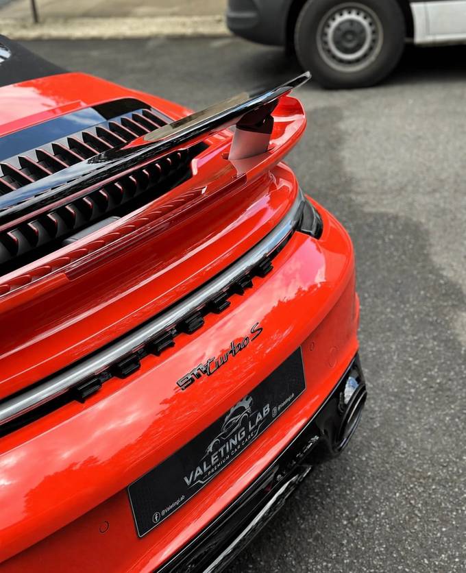 Close up of the gloss on a Guards Red Porsche after valeting