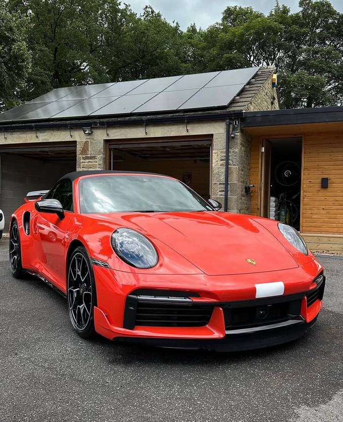 Guards Red Porsche 911 front after a full valet